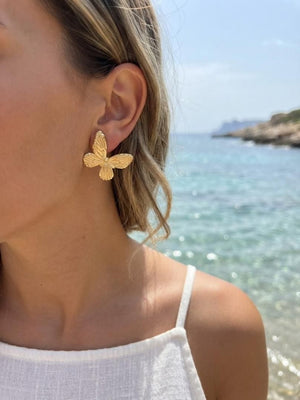 Gold butterfly statement earrings