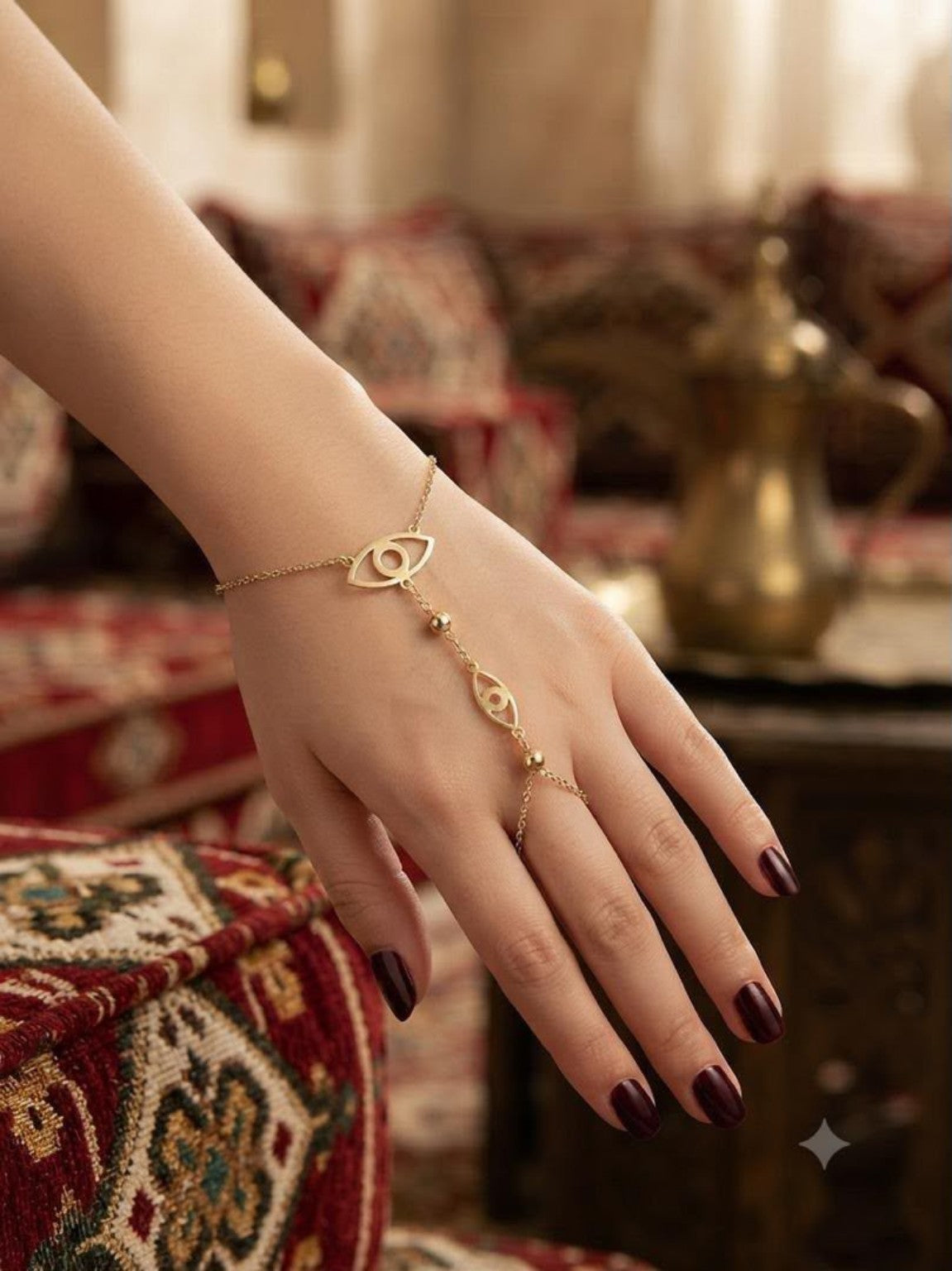 Gold-tone evil eye hand chain